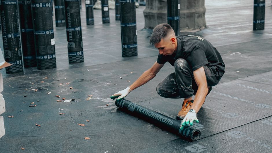 Close-up of a sealant patch applied to a gutter seam